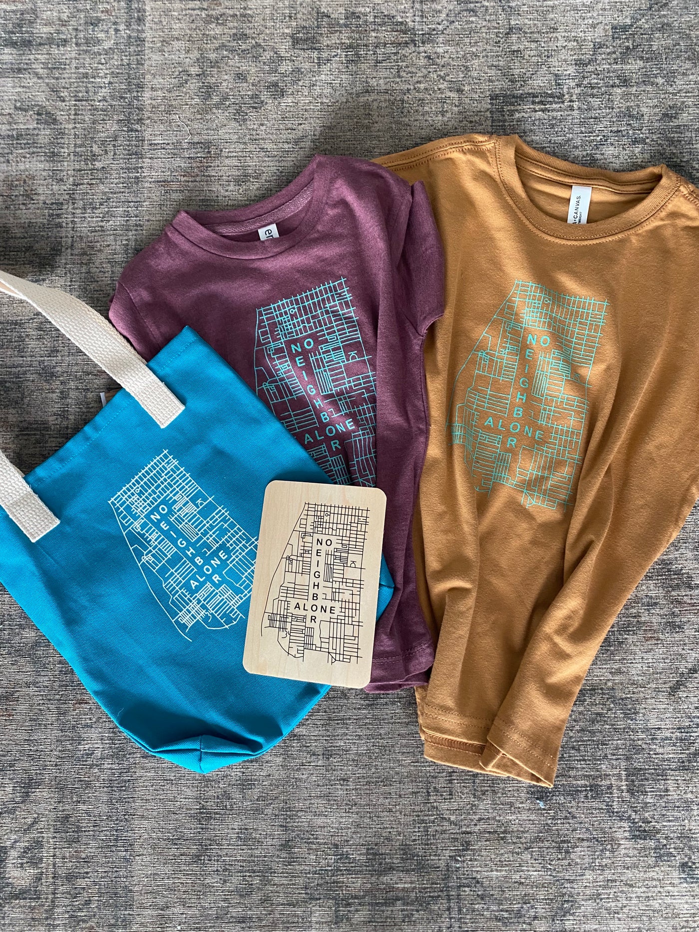"No neighbor alone" kids shirts